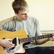 Image for article titled Area Man Having One Of His Little Bursts Of Energy Where He Tries To Write A Song